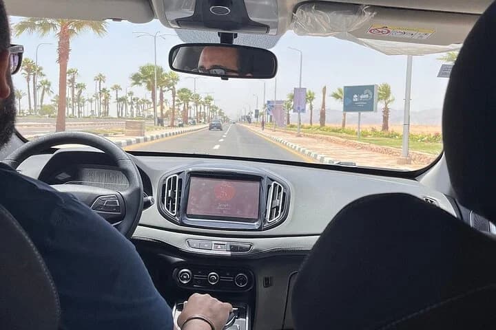 Driver taking a customer to the airport in Sharm El Sheikh – Intours Egypt MPV car